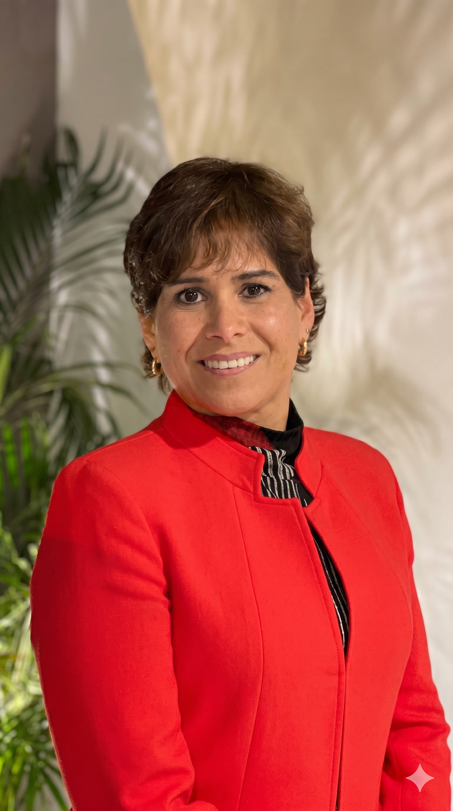 Claudia, Co-Founder and Director of Marketing at SMC Frame